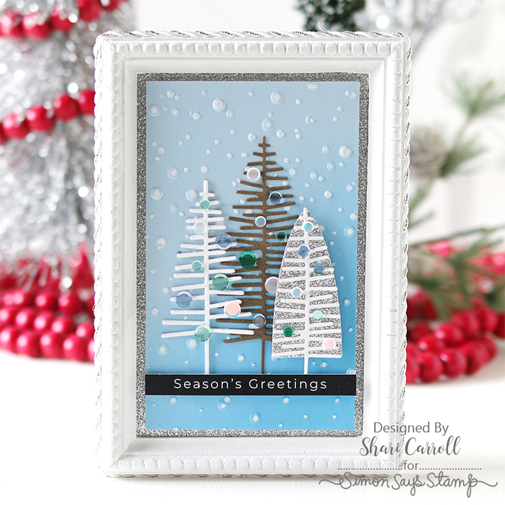All the Joy Blog Hop Shari Carroll Soft Snowfall embossing folder, Color Blends Holiday Assortment, Large Bottle Brush Trees and Small Bottle Brush Trees dies, Reverse Christmas Greetings sentiment strips, and Frosty Pines confetti