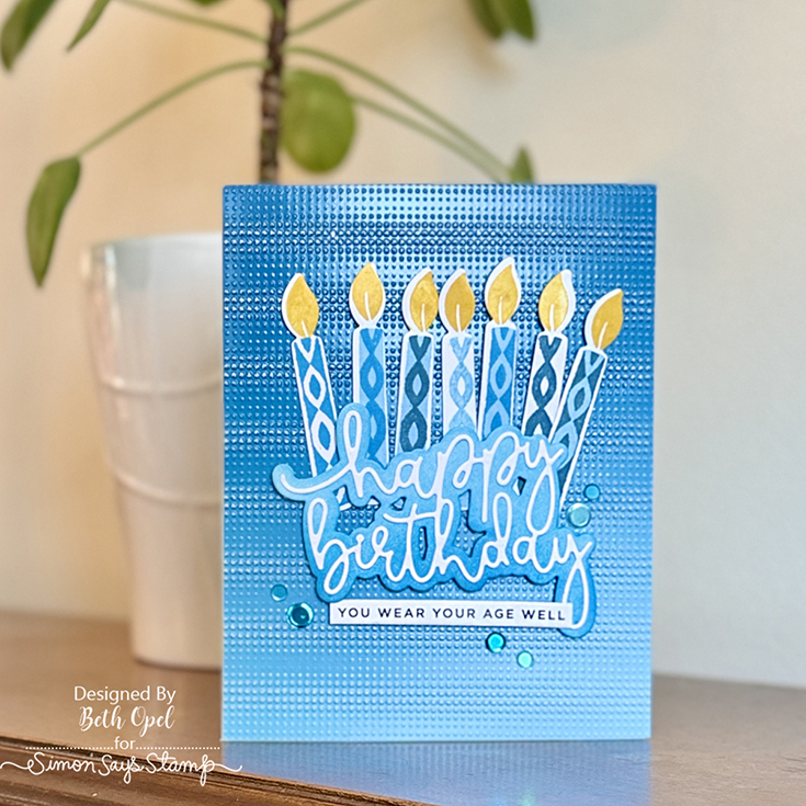 DieCember® Blog Hop Beth Opel Christmas Candle stamp and coordinating die, Bouncy Happy Birthday die, Blue Frost Embellishment mix, and Just Sayin’ sentiment strips