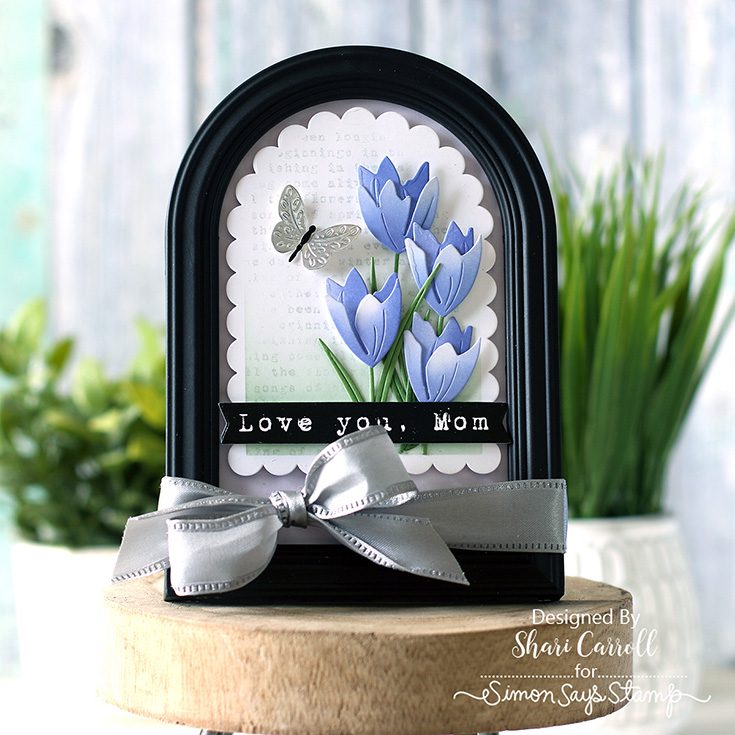 In My Heart Blog Hop Shari Carroll Fresh Crocus Duo, Flourish Butterfly Trio, and Scalloped Arches dies, Nature in Bloom stamp, and EZ Reverse Mom Strips